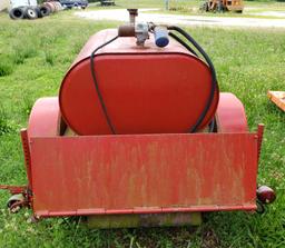 Red Farm Trailer with 275 Gal +/- Fuel tank Note: The trailer toung is missing the mechanism