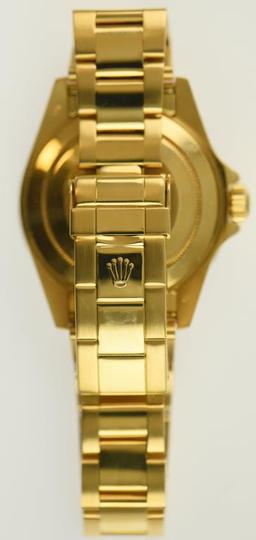 Lot #1 - 18K Yellow Gold Men’s Rolex Submariner with Automatic Movement. 18K Round Case. 18K