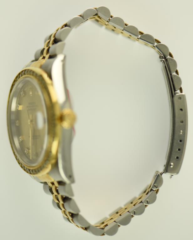 Lot #6 - 18K Yellow Gold/Stainless Men’s Rolex with Champagne Diamond dial & Diamond Bezel.