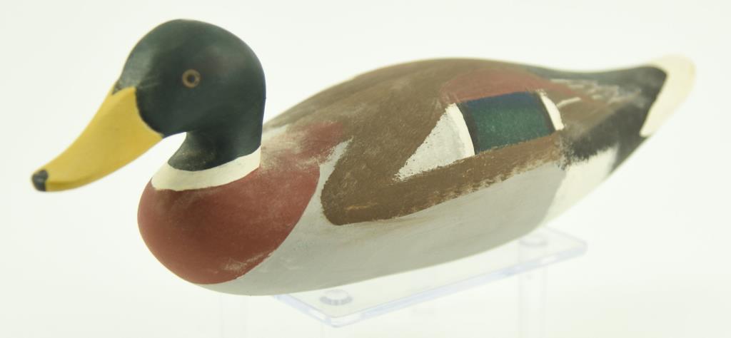 Lot #340 - Pair of Jim Pierce 1976 1/3 size carved Mallards drake and hen signed and dated on