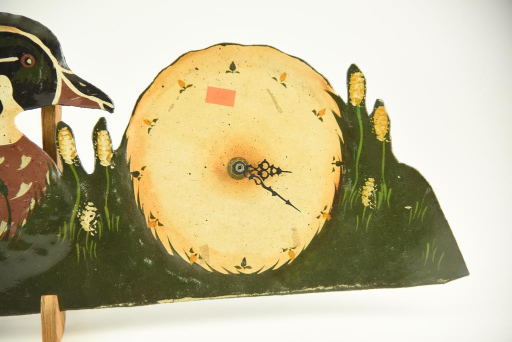 Lot # 4574 - Hand made tin duck cut out clock with painted wood duck signed R. Donnoly (25”x 8”)