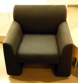 Lot #1252 - Mueller Furniture Corporation black upholstered loveseat (30” x 57” x 31”) and