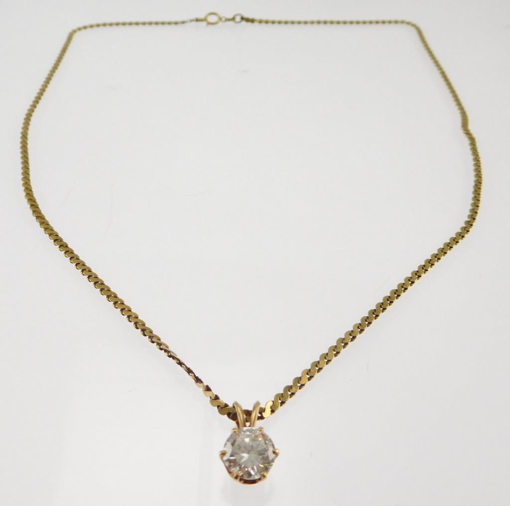 Lot #11: 14k yellow gold ladies 6 prong solitaire diamond pendant, containing a brilliant cut