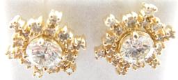 Lot #14: 1 pair of 14k yellow gold ladies 4 prong solitaire pierced earrings, each containing a