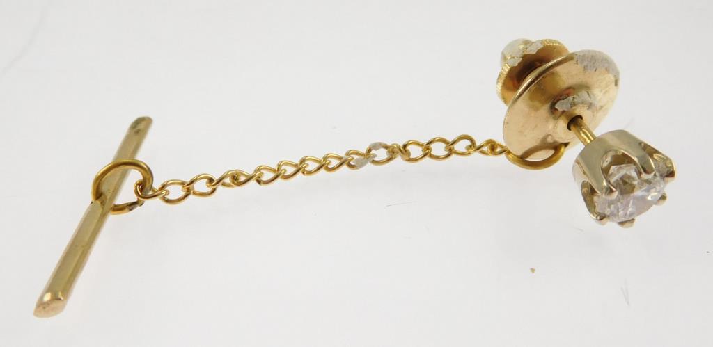 Lot #15: 14k yellow gold gents 6 prong head solitaire tie tac, containing a brilliant cut diamond