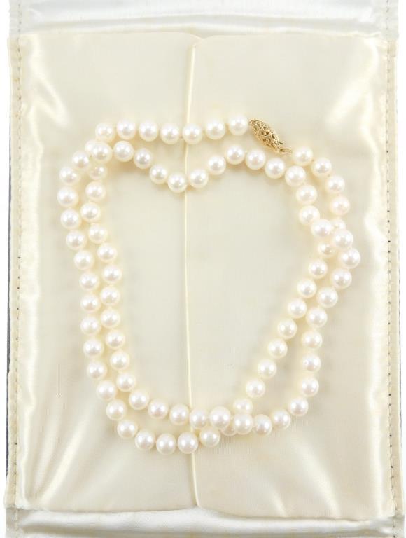 Lot #2: Ladies strand of uniform cultured pearls 24" in length, A- Quality with visual blemishes.