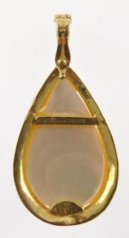 Lot #3: 14k yellow gold ladies’ enhancer , containing a bezel set pear shape Mabe' pearl