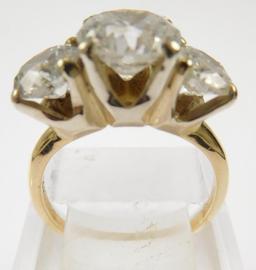 Lot #8: 14k ladies 3 diamond ring: (14k yellow gold narrow half round shank/ 3 - 14k white gold