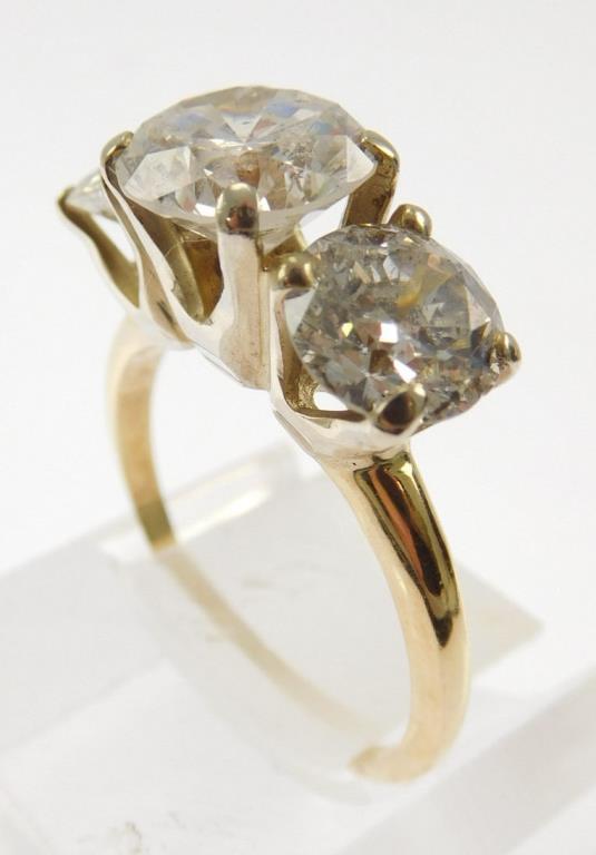 Lot #8: 14k ladies 3 diamond ring: (14k yellow gold narrow half round shank/ 3 - 14k white gold