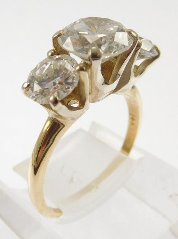 Lot #8: 14k ladies 3 diamond ring: (14k yellow gold narrow half round shank/ 3 - 14k white gold