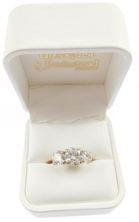 Lot #8: 14k ladies 3 diamond ring: (14k yellow gold narrow half round shank/ 3 - 14k white gold