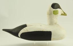 Lot #336 - New England Carved Eider drake decoy in original paint with glass eyes unsigned