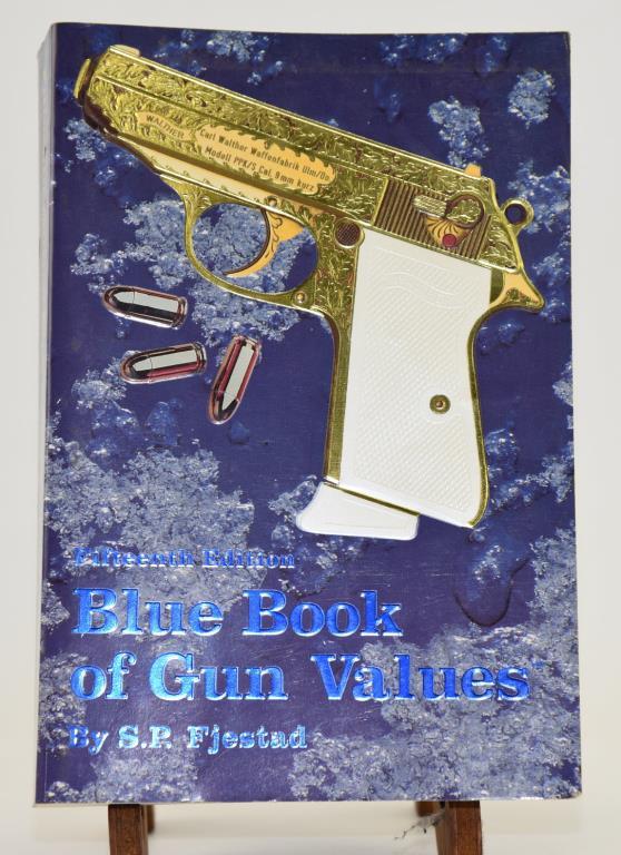 Lot #19 - Several gun related books: The Nature of War, The Woodcock Book, Fifteenth Edition Blue