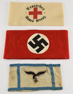 Lot #2348 - (3) German WWII arm bands to include: Deutsches Rotes Kruez military Cross, cloth