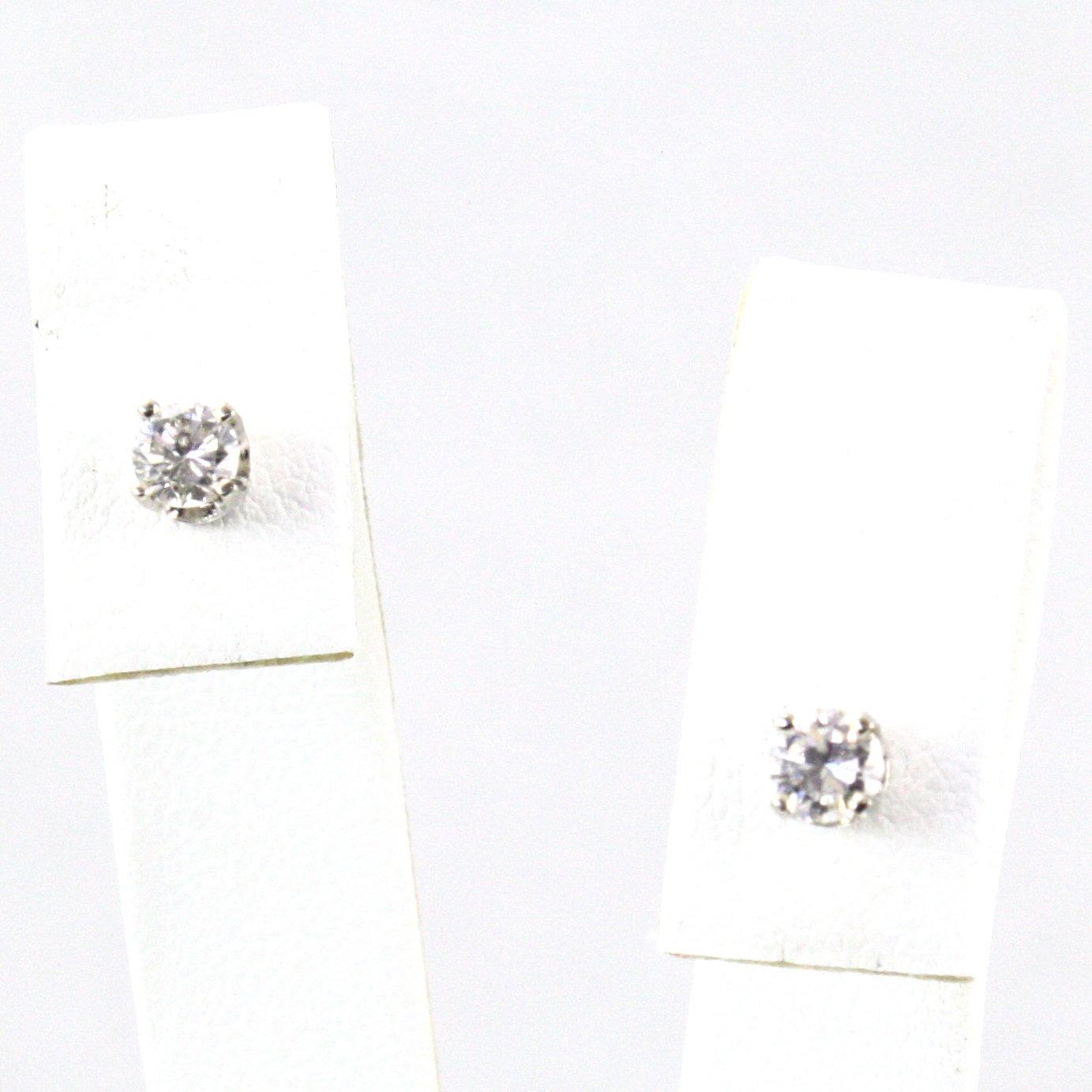 Pair of new 14K white gold diamond stud earrings