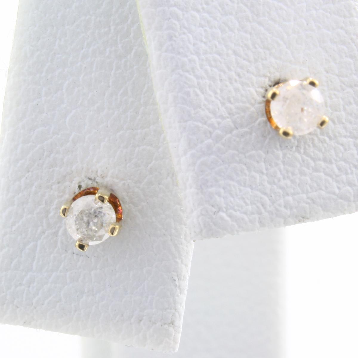 Pair of estate 10K yellow gold diamond stud earrings