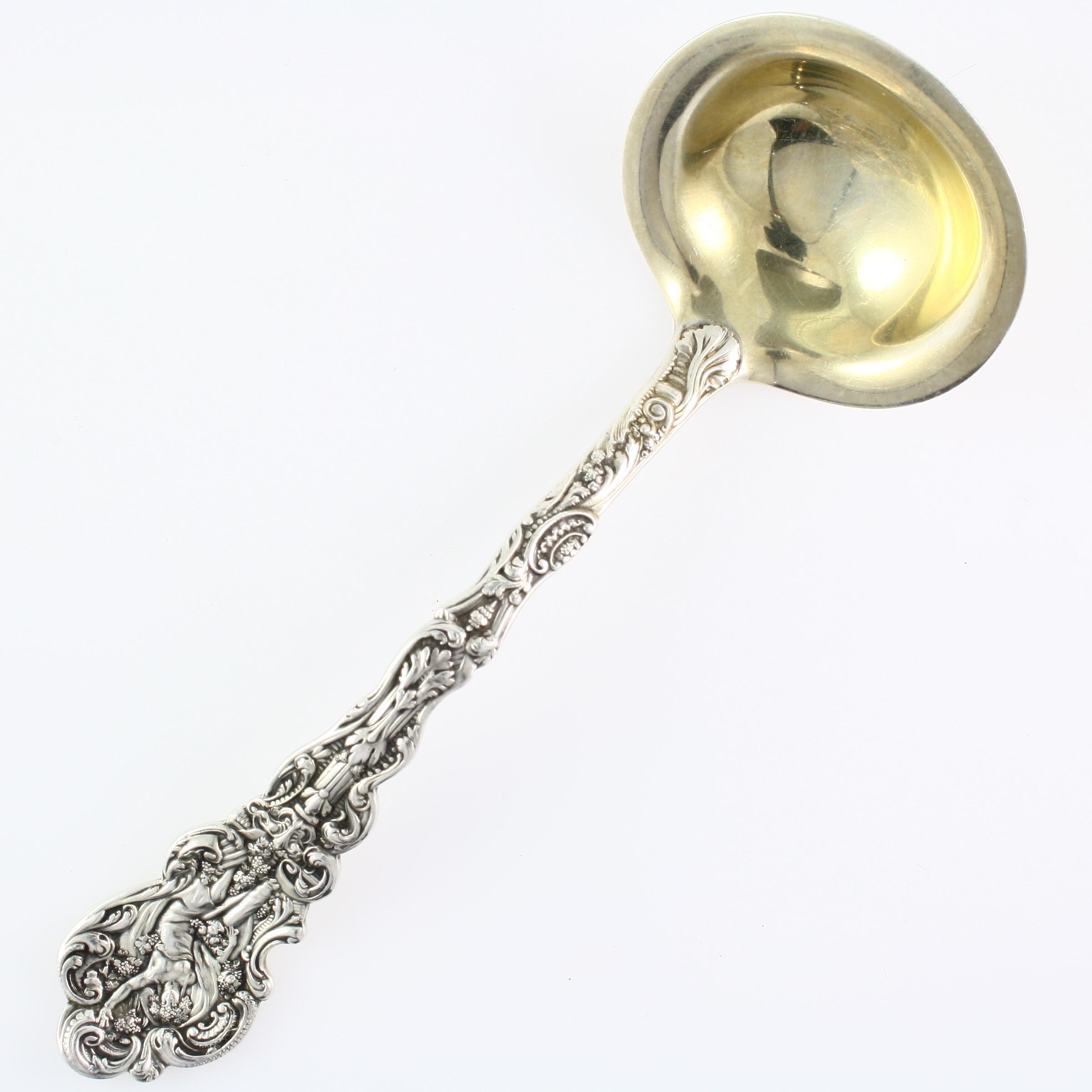 Antique Art Nouveau gilt sterling silver ladle
