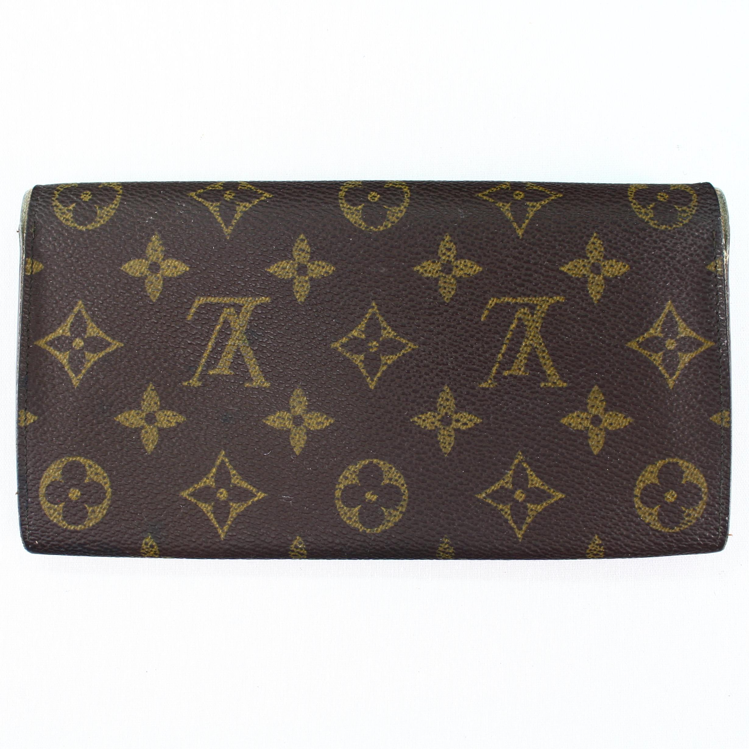 Authentic estate Louis Vuitton monogram canvas Sarah wallet