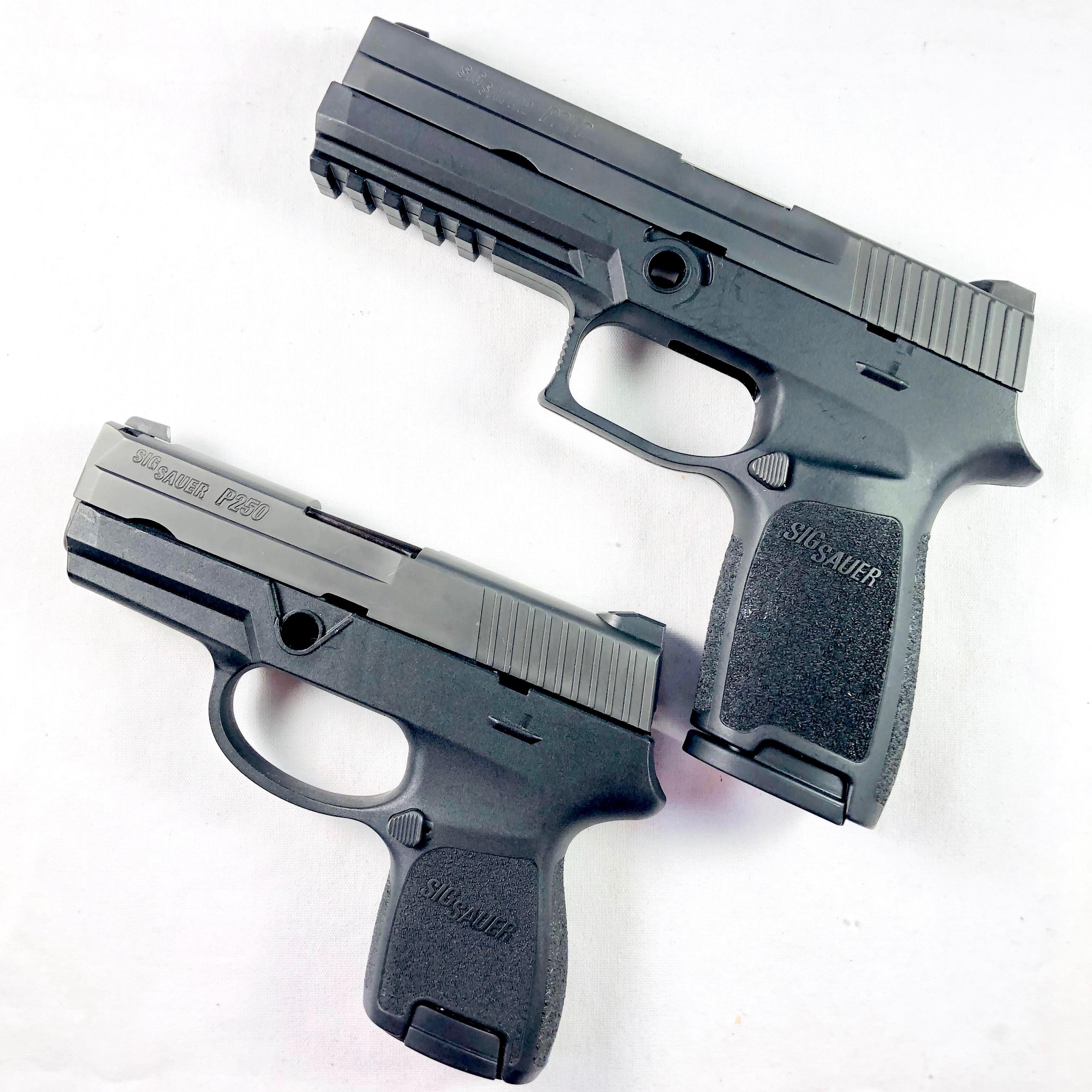 Boxed pair of like-new Sig Sauer P250 semi-automatic pistols, 9mm cal