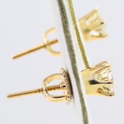 Pair of estate 14K yellow gold diamond stud earrings