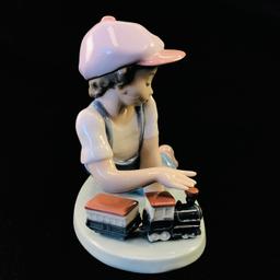 Estate Lladro #7619 "All Aboard" porcelain figurine with original box