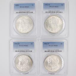 Investor's lot of 4 mixed-date certified U.S. Morgan silver dollars
