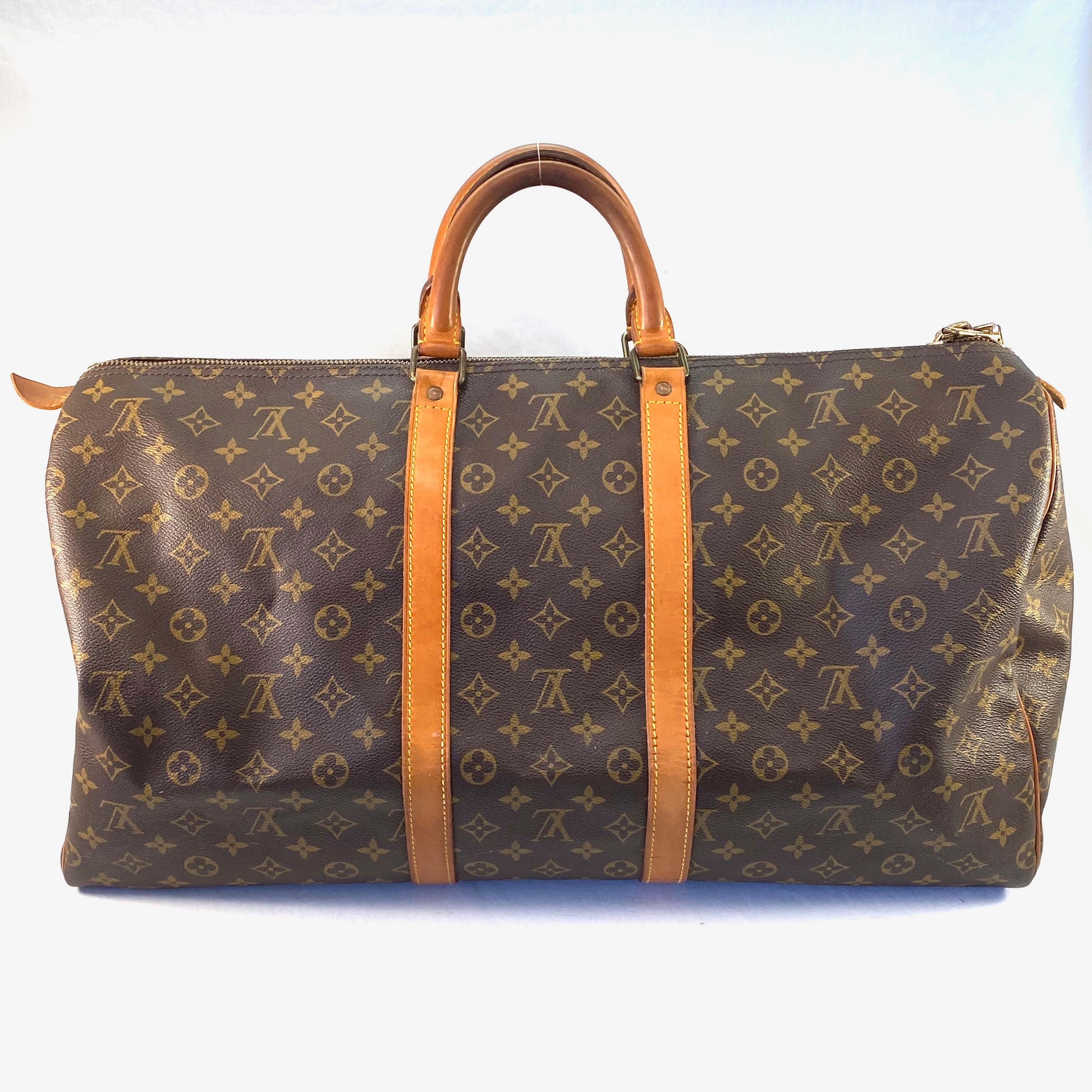 Authentic estate Louis Vuitton "Keepall 50" monogram canvas & leather luggage bag