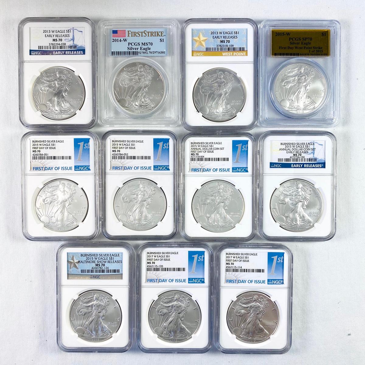 Lot of 11 certified mixed date 2013-W to 2017-W burnished U.S. American Eagle silver dollars