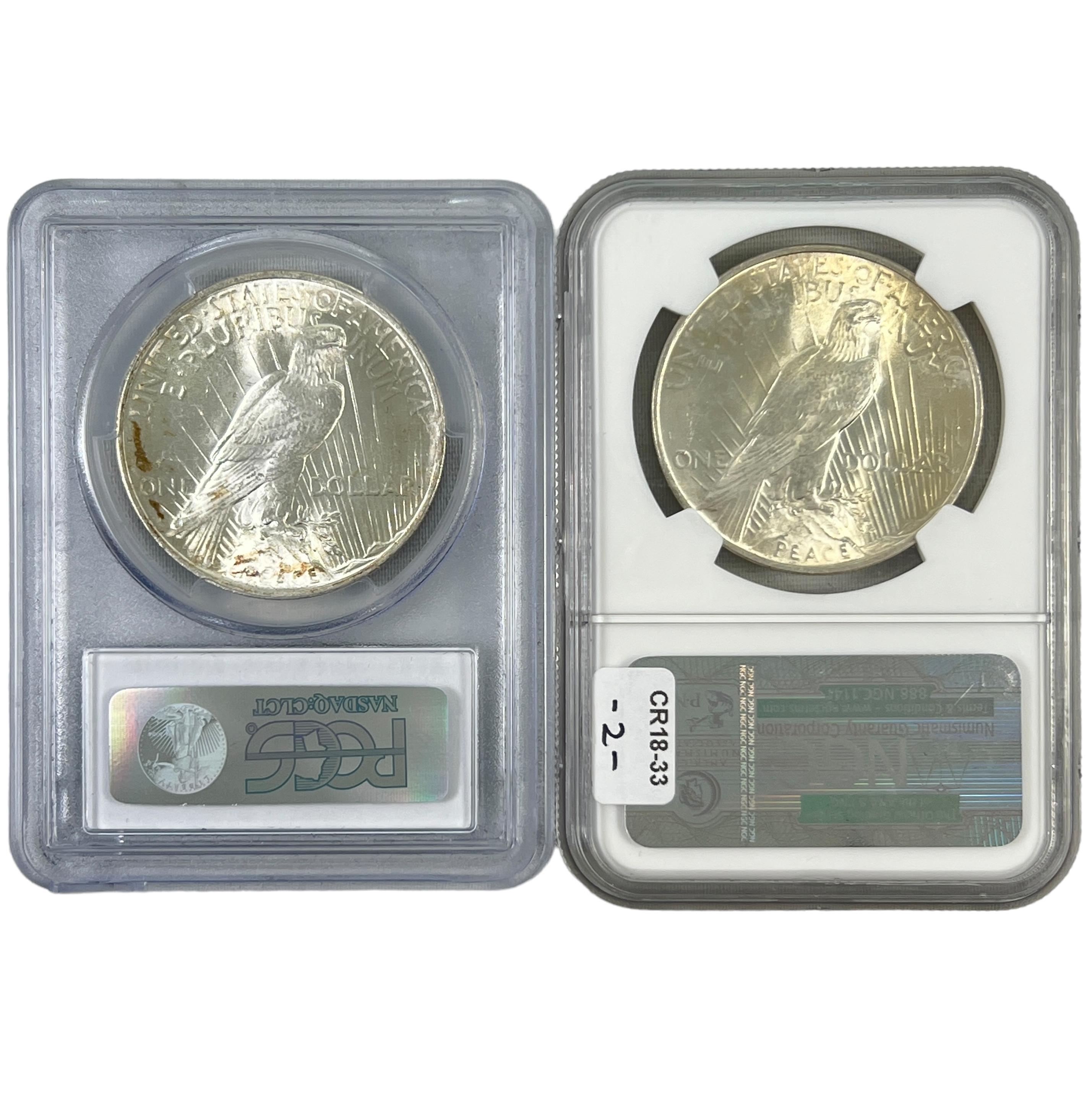 Pair of certified 1923 U.S. peace silver dollars