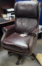 Leather office chair on casters