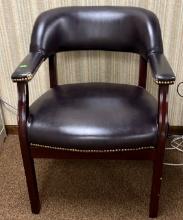 Leather upolstered arm chair