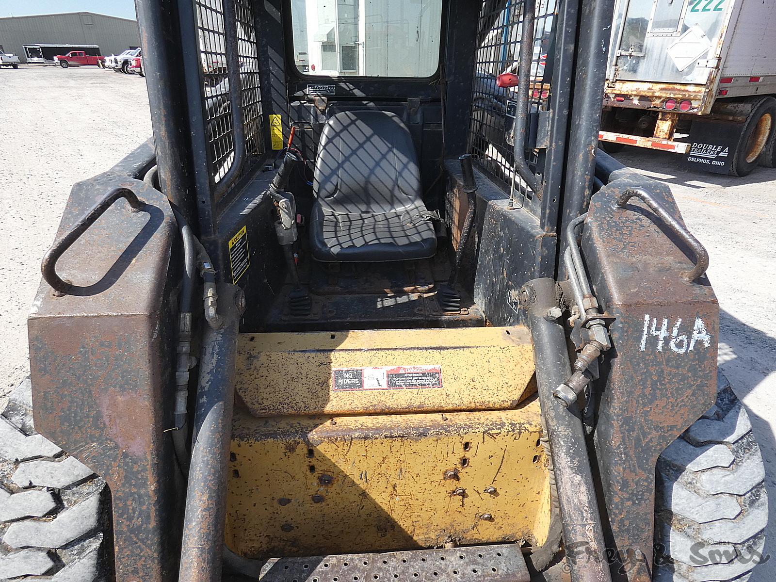 New Holland LX665 Skidloader, SN:864396, QT GP Bucket, Aux. Hyd, Reads 2084