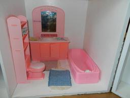 4 Barbie's, clothing, and playhouse