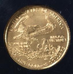 2005 $5 1/10th OUNCE GOLD EAGLE IN PLASTIC HOLDER