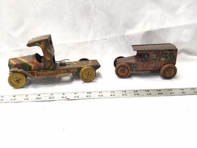 2 Tin Type Trucks