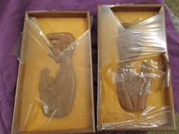 2 pc carved wooden framed pictures of men/women praying