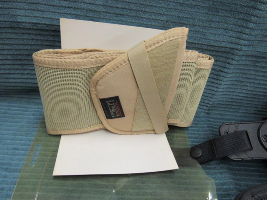 2 Sidekick holsters, 1 size 5 and 1 size 4 belly band #8743-4 with packaging
