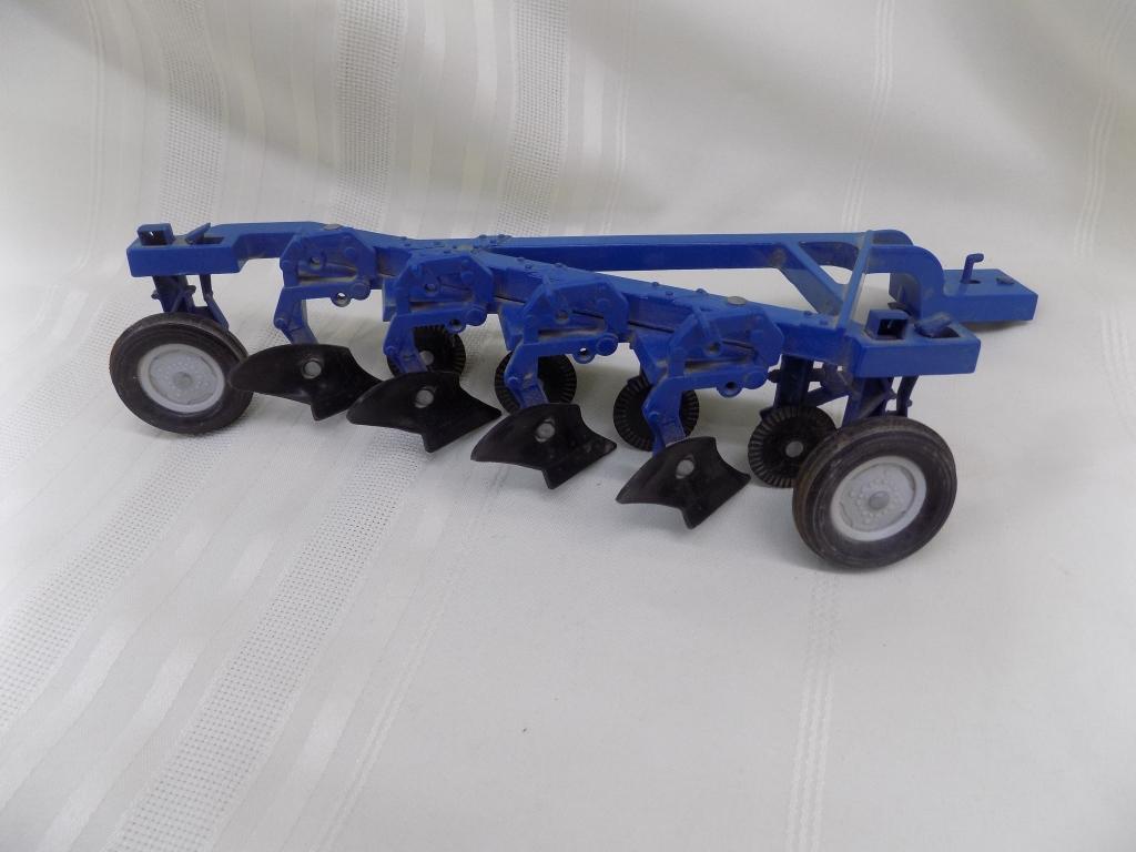 Ertl Ford plow stamped 1604, 12 1/2" long,