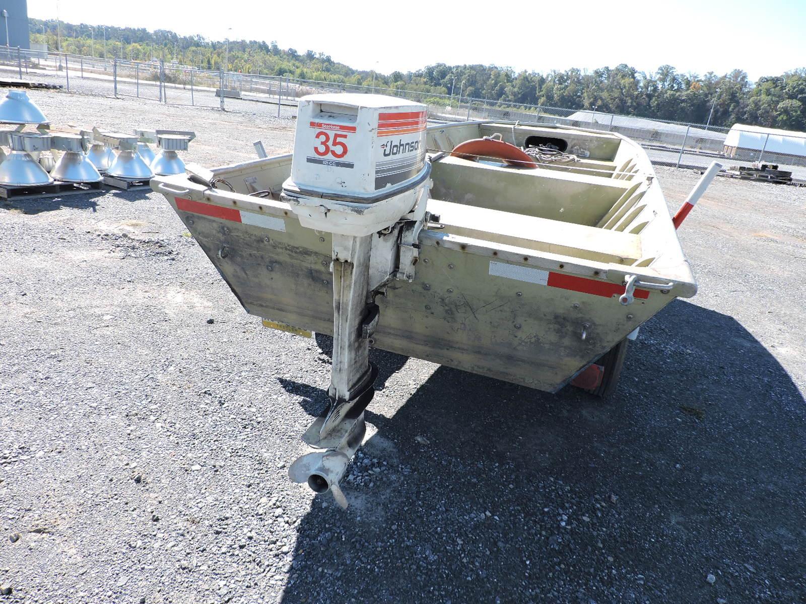 Traveler Flat Bottom Boat with Trailer & Johnson Outboard