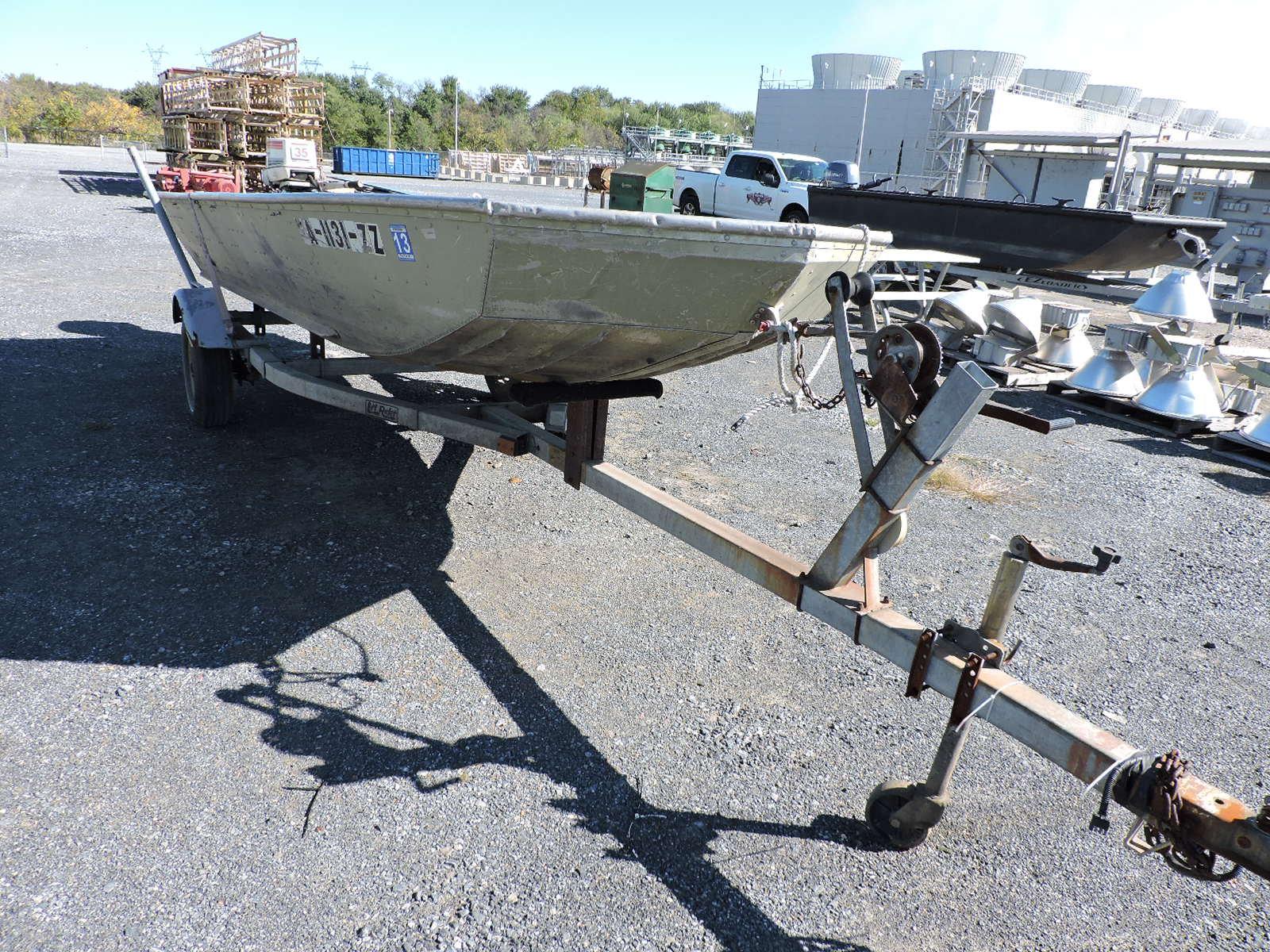 Traveler Flat Bottom Boat with Trailer & Johnson Outboard