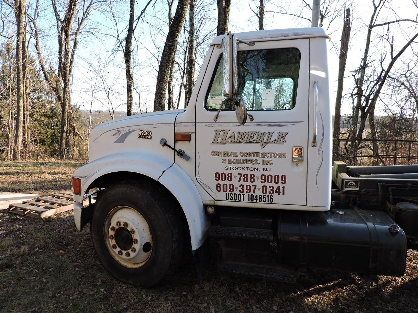 1997 International 4900 Regular Cab - Roll-Off / Hook Truck - with 3 Dumpsters & Flat Bed