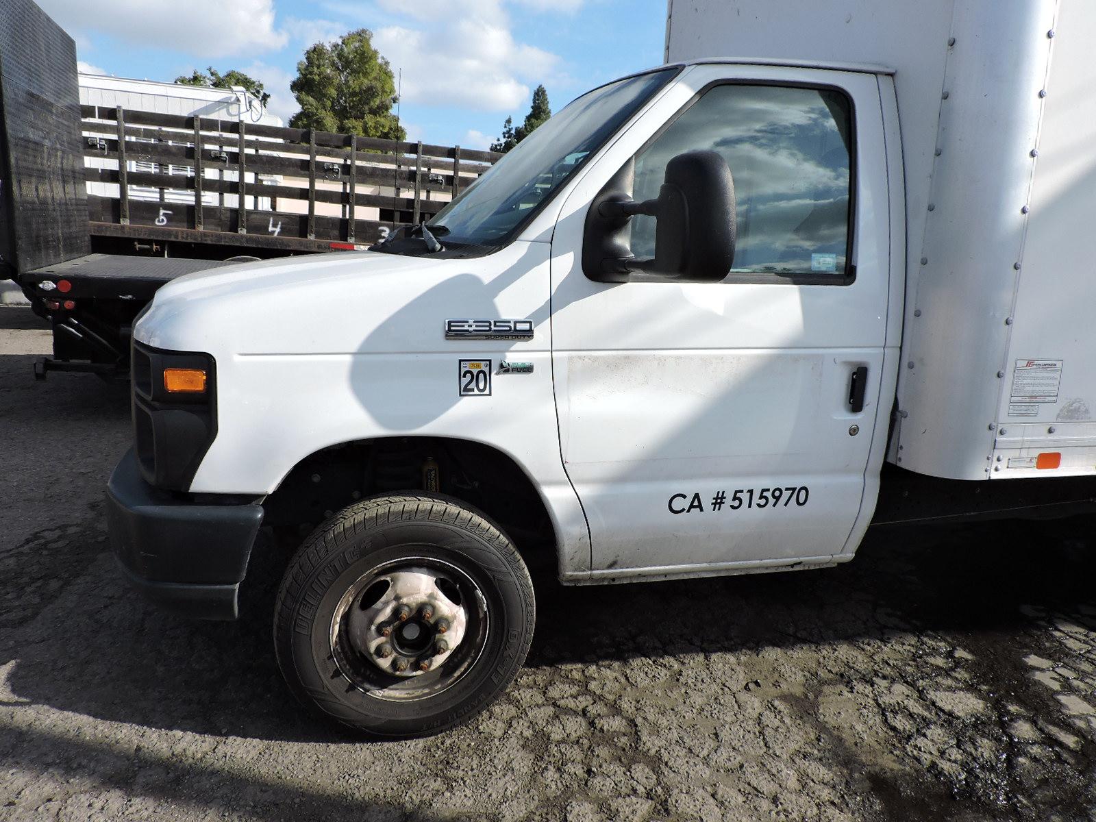 2015 Ford E350 Box Truck with a 14-Foot SUPREME Box - with Approx. 84,000 Miles.