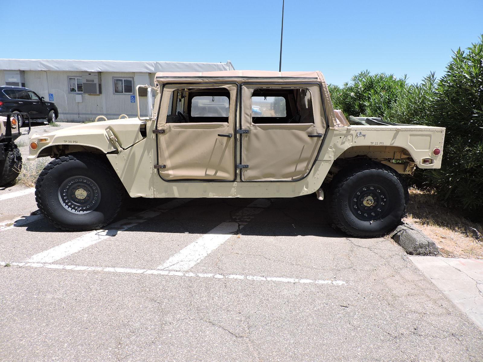 HUMVEE -- AM GENERAL 1.25 Ton, 4X4, W/E, HMMWV M-998.  Date: February 1991.  3411 Miles.