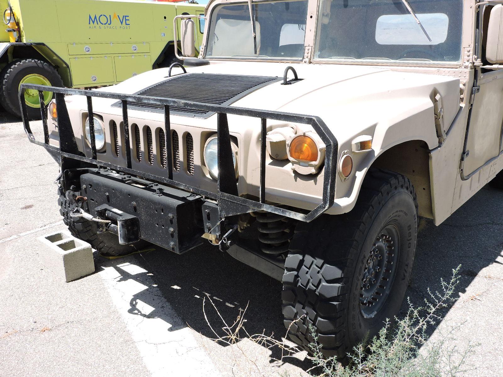 HUMVEE -- AM GENERAL 1.25 Ton, 4X4, W/E, HMMWV M-1038.  Date: March 1987.  54,558 Miles.