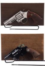 Two Colt Double Action Revolvers with Boxes