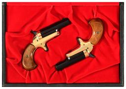 Three Derringer Pistols with Cases