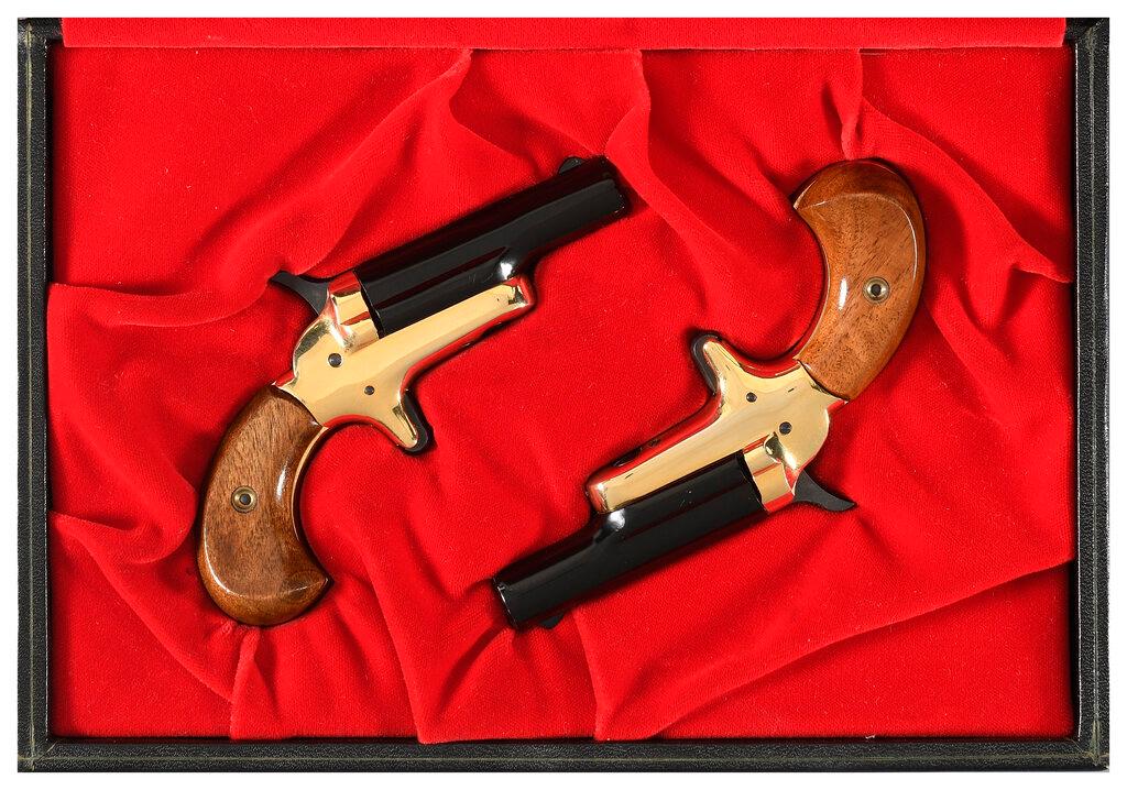 Three Derringer Pistols with Cases