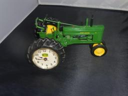 J.D. 1/16 tractor w/clock in wheel