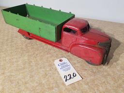 Vintage red truck with green box