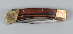 Buck #110 Folding Knife - 4 Pins